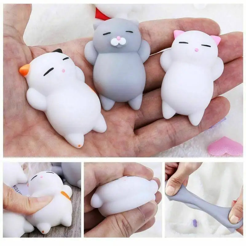 Three sleepy mini mochi cat squishies in white, gray and calico resting in a hand, with squeeze and stretch close-ups