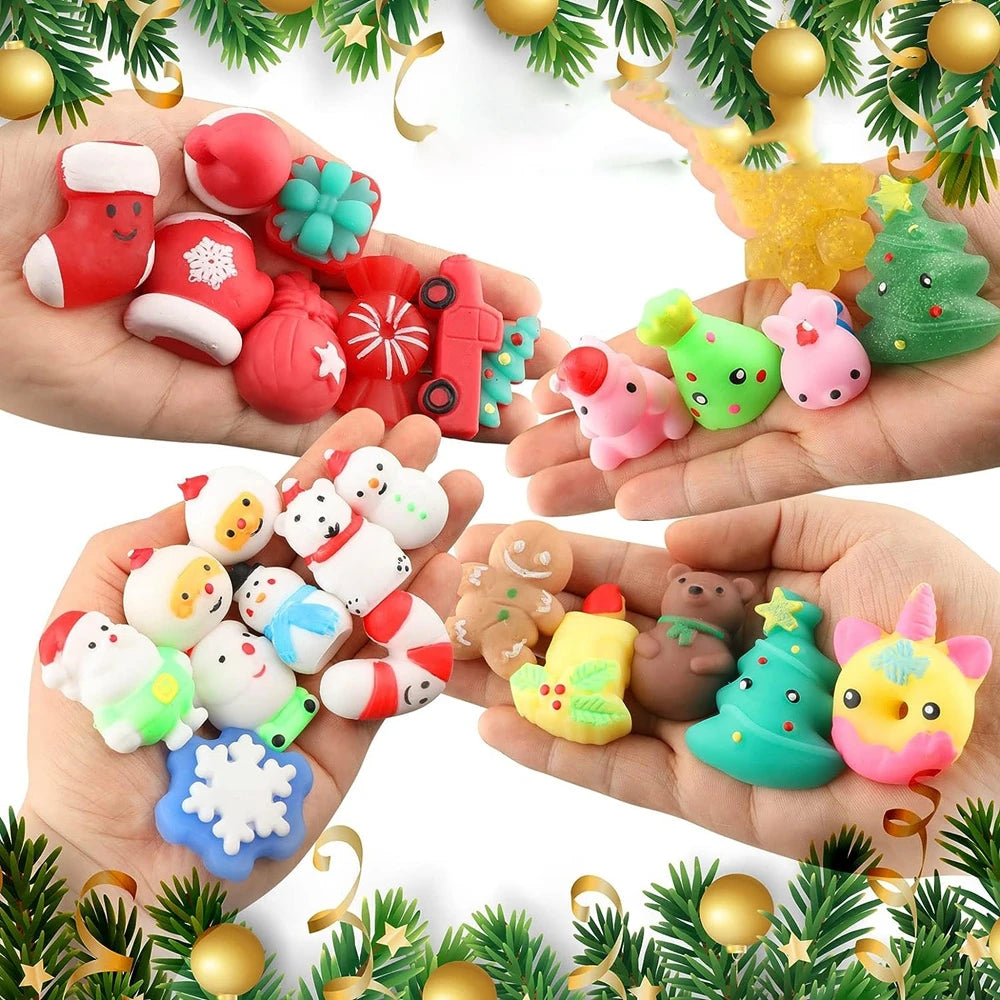 Hands holding assorted Christmas mochi squishies like Santa, snowmen, stockings and trees (12 random pieces per order)