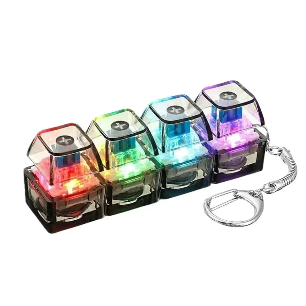 Black mini 4-key clicker keychain with smoky black base and keys lit up in rainbow colors
