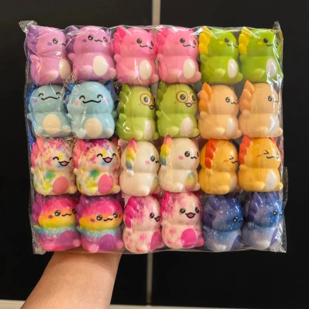 A bag of mini newt squishies held up to show the mix of colors (larger bag shown; this pack has 12)