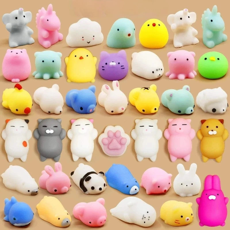 Grid of mini mochi animal squishy styles in pastel colors (assortment is random)