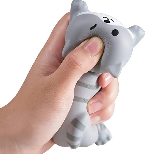 Grey cat silicone wrist rest being squeezed in a hand