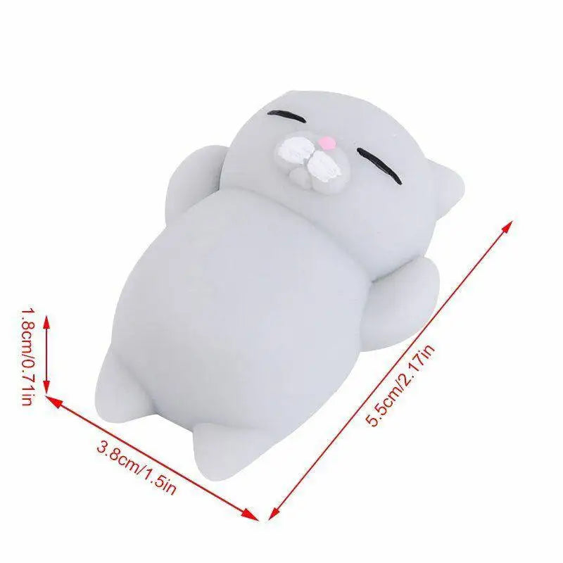 Gray mini mochi cat squishy with size guide: about 5.5 cm long, 3.8 cm wide and 1.8 cm tall