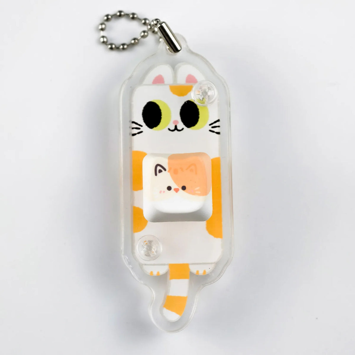 Clear acrylic calico cat keychain with one cat keycap on a ball chain