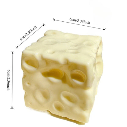 Cheese cube squishy with holes, about 6 cm (2.36 in) on each side