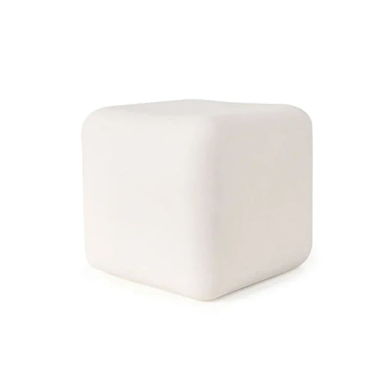Single white tofu cube squishy, about 5.5 cm, on a white background