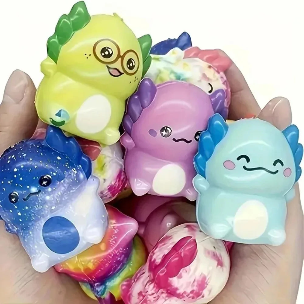 Handful of colorful mini newt squishies, including galaxy, purple and blue newts