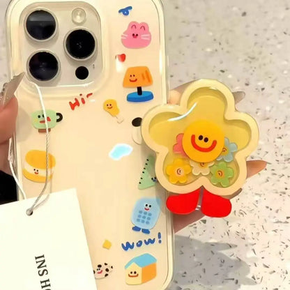Flower shaker phone grip attached to the back of a phone