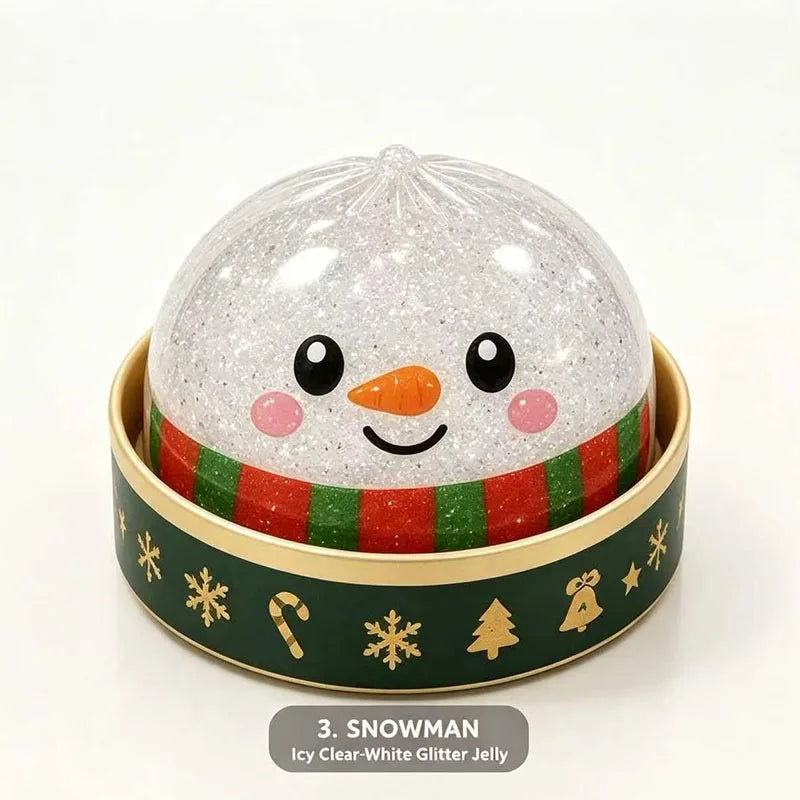 Snowman dumpling squishy with a red and green scarf in a green holiday steamer cup (one of the designs)