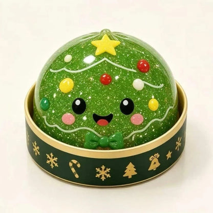 Christmas tree dumpling squishy with green glitter in a green holiday steamer cup (one of the random designs)