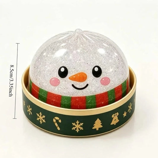 Snowman dumpling squishy in a green holiday steamer cup, about 8.5 cm tall (one of the random designs)