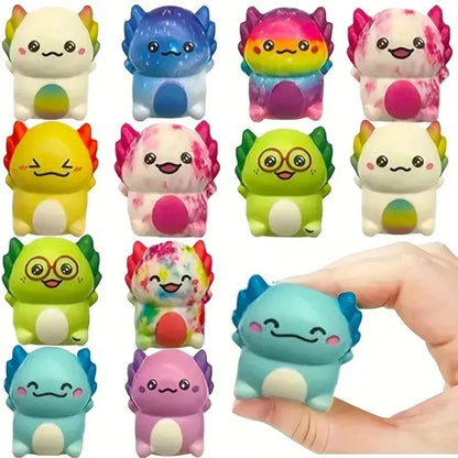 Assorted mini newt squishies with one blue newt held between fingers for size