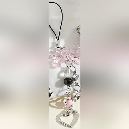 Pink bow beaded phone charm strap with its phone loop cord, heart and star charms